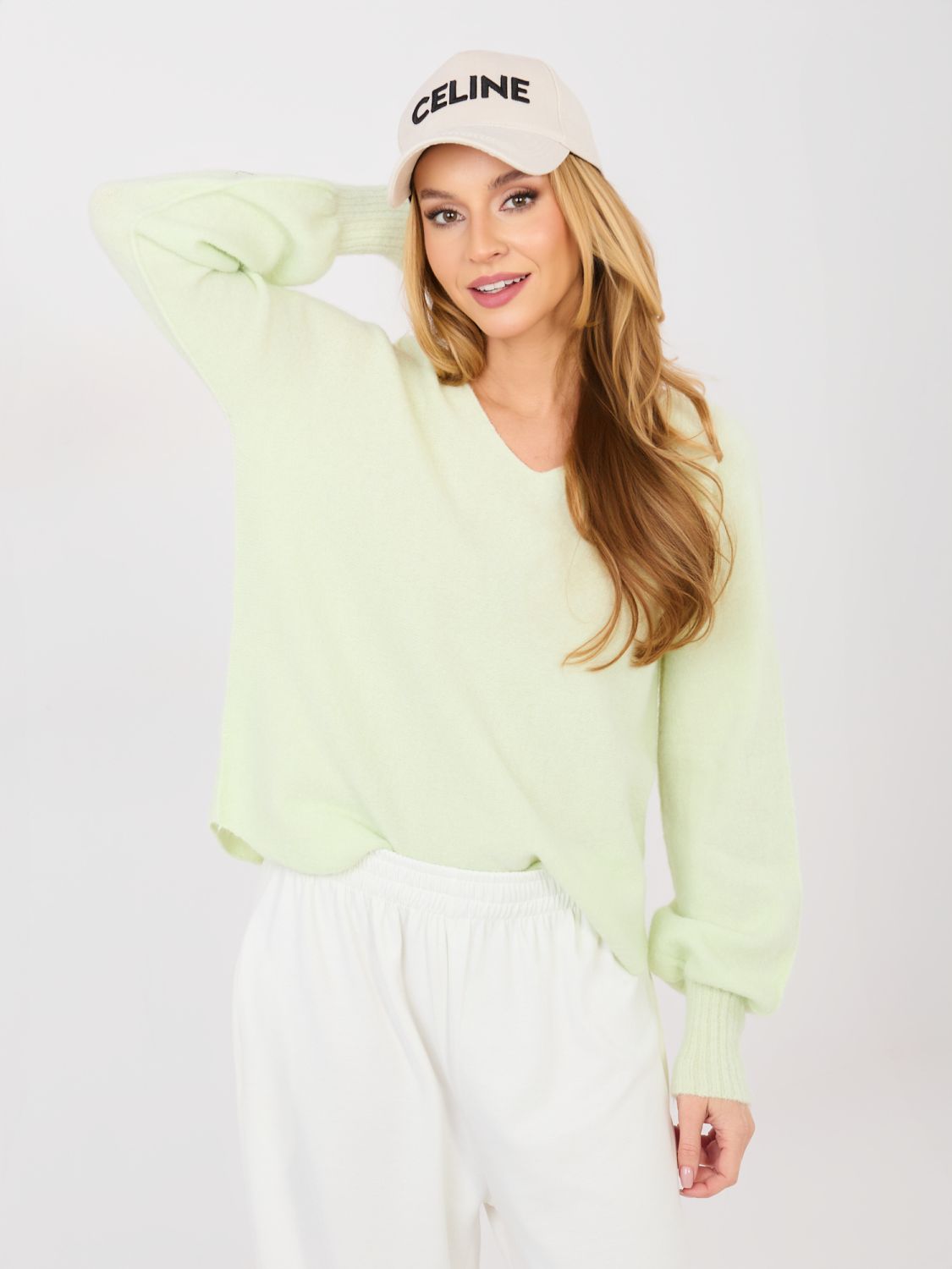Light green V-neck sweater with balloon sleeves