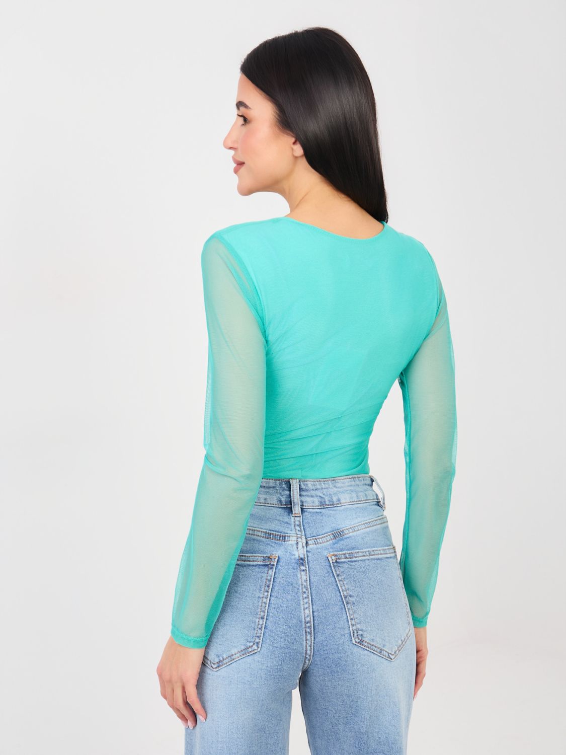 Elegant blue bodysuit with long sleeves and round neckline