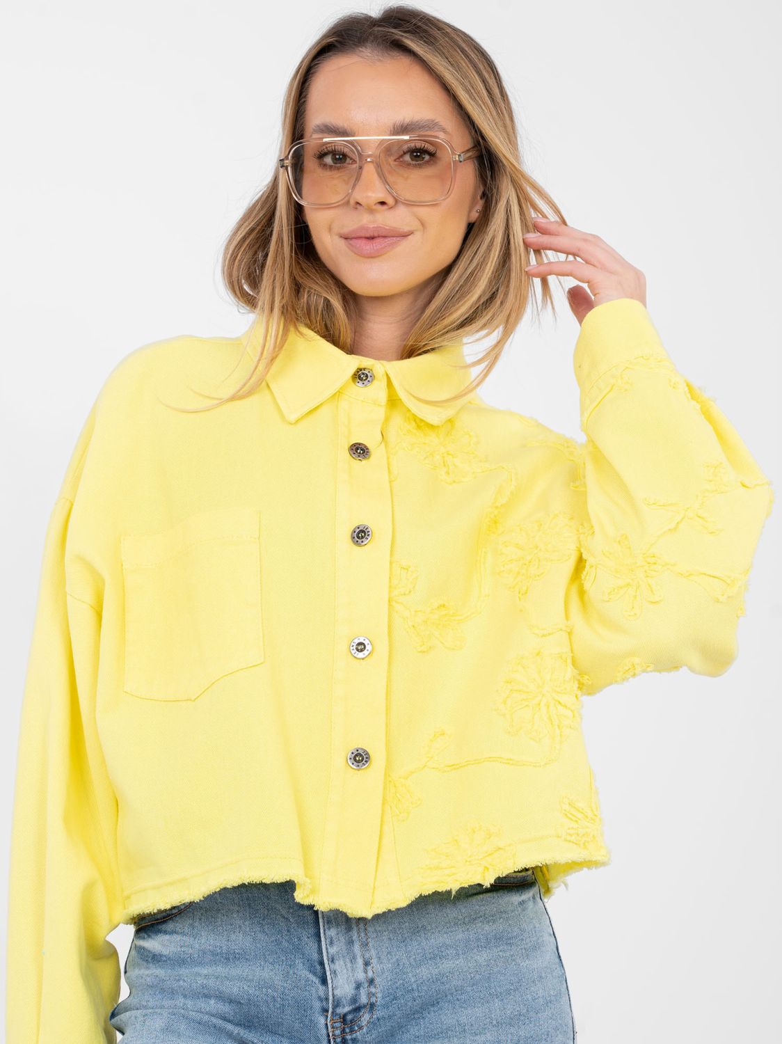 Short yellow denim jacket with floral appliqué