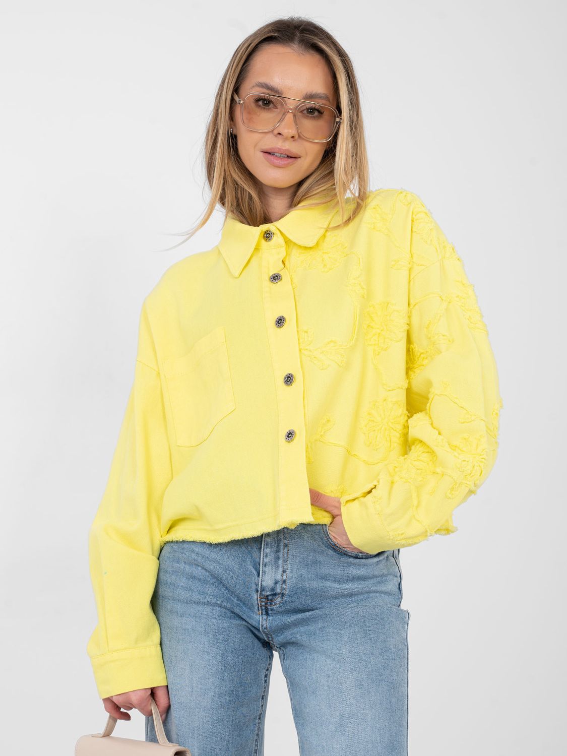 Short yellow denim jacket with floral appliqué