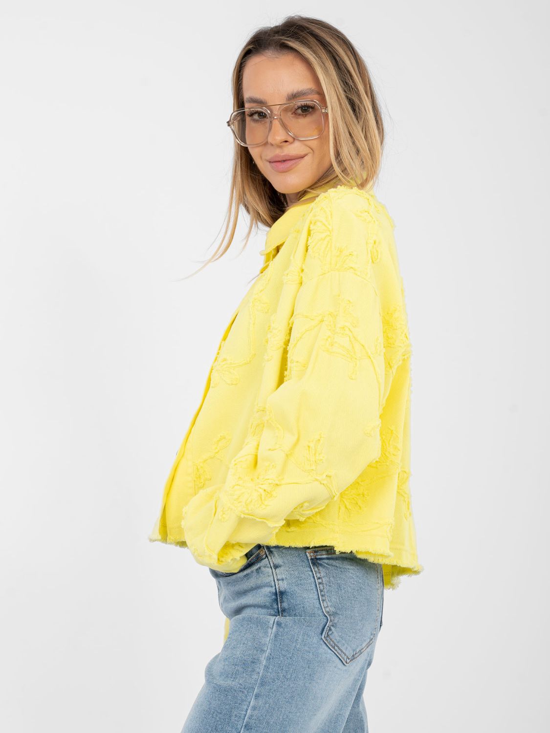 Short yellow denim jacket with floral appliqué