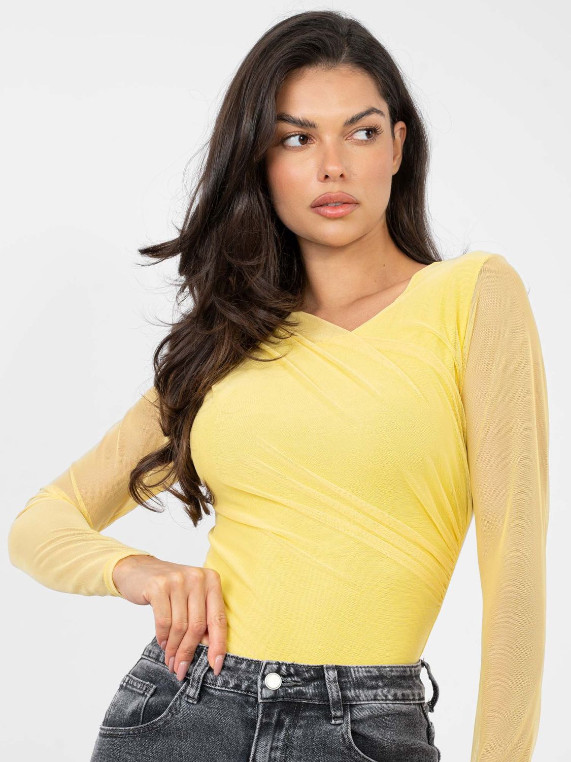Elegant yellow bodysuit with long sleeves and round neckline