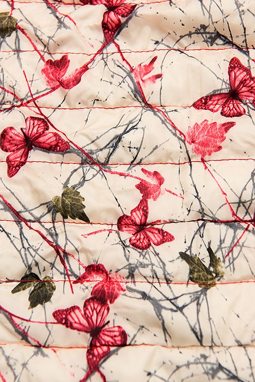 Red puffer jacket with patterned lining