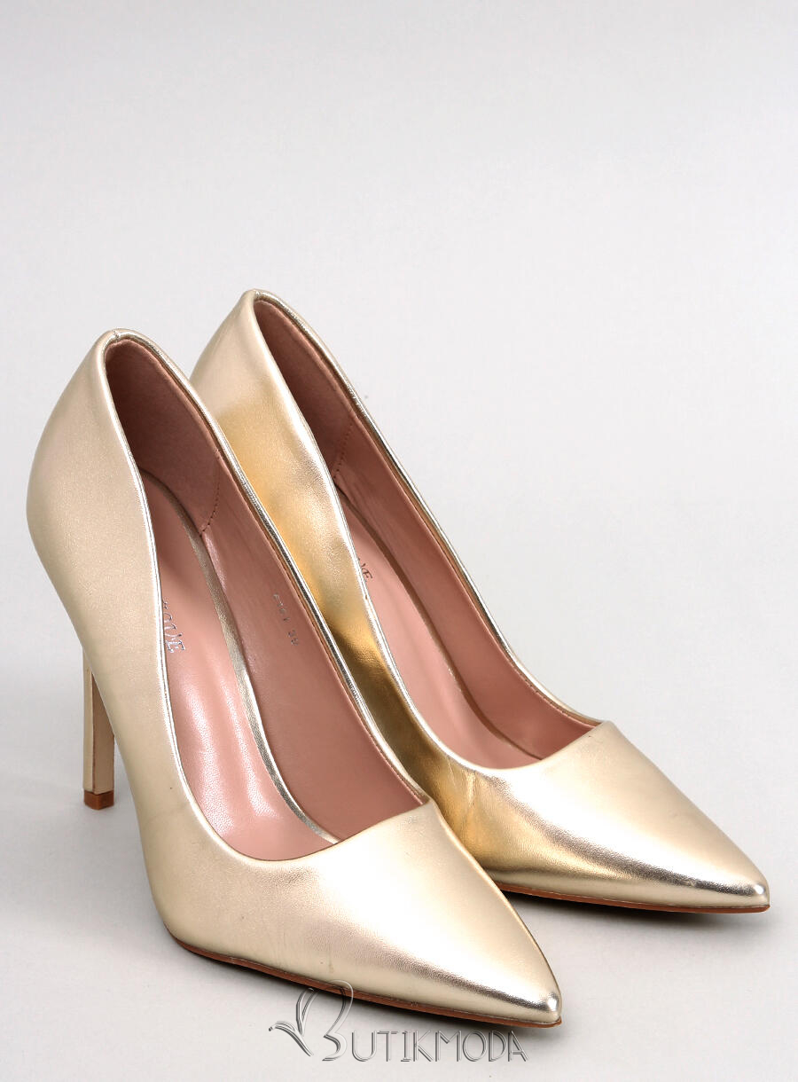 Gold pumps on a stiletto heel