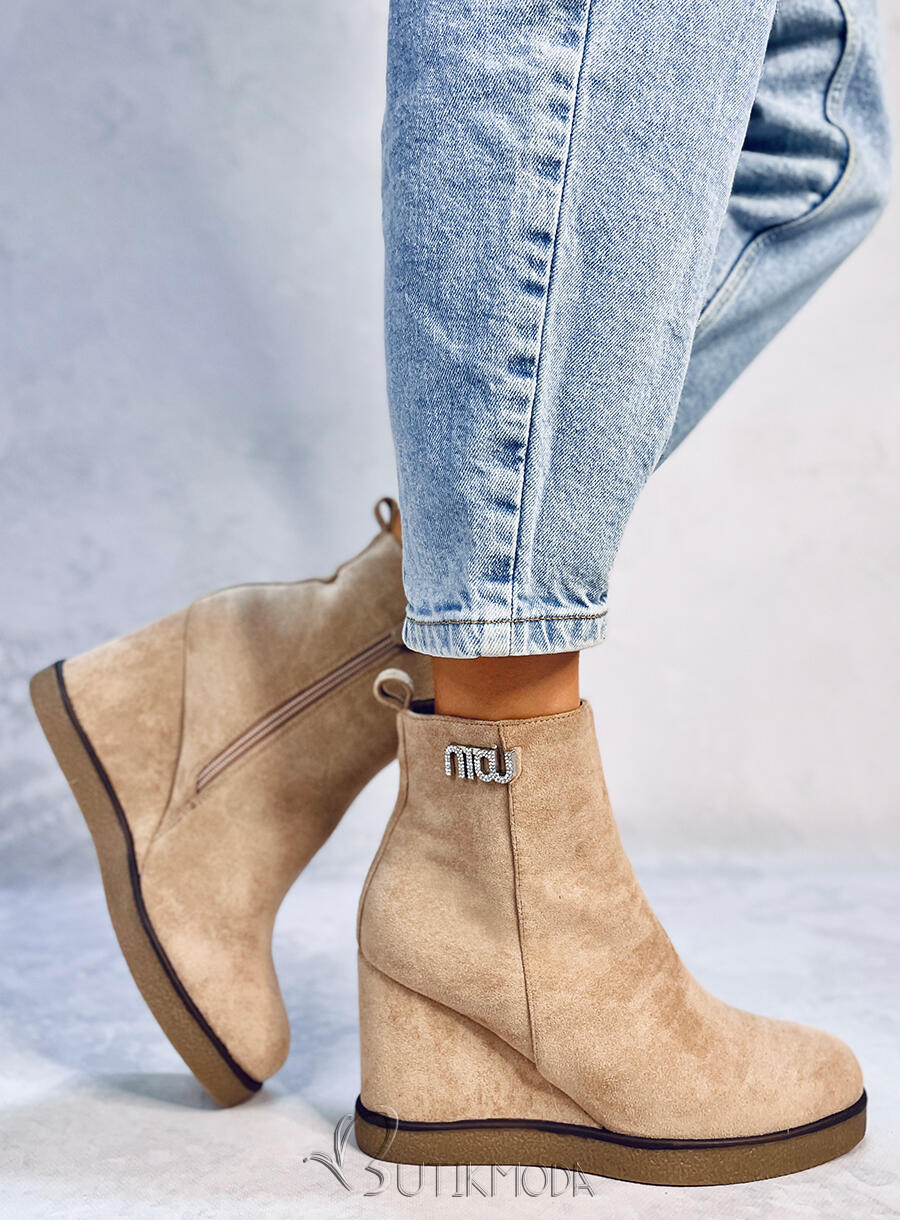 Beige ankle boots on a wedge heel