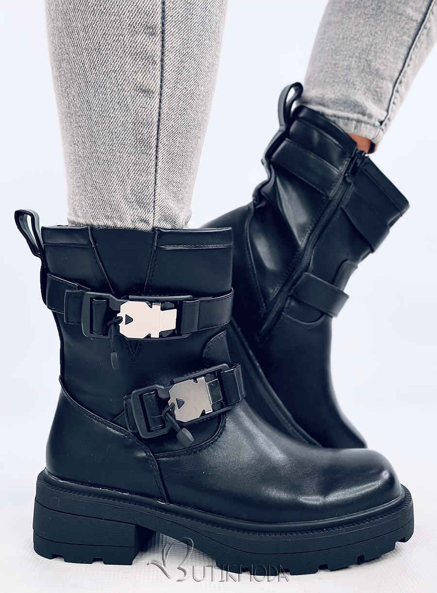 Black boots with buckles on a thick sole