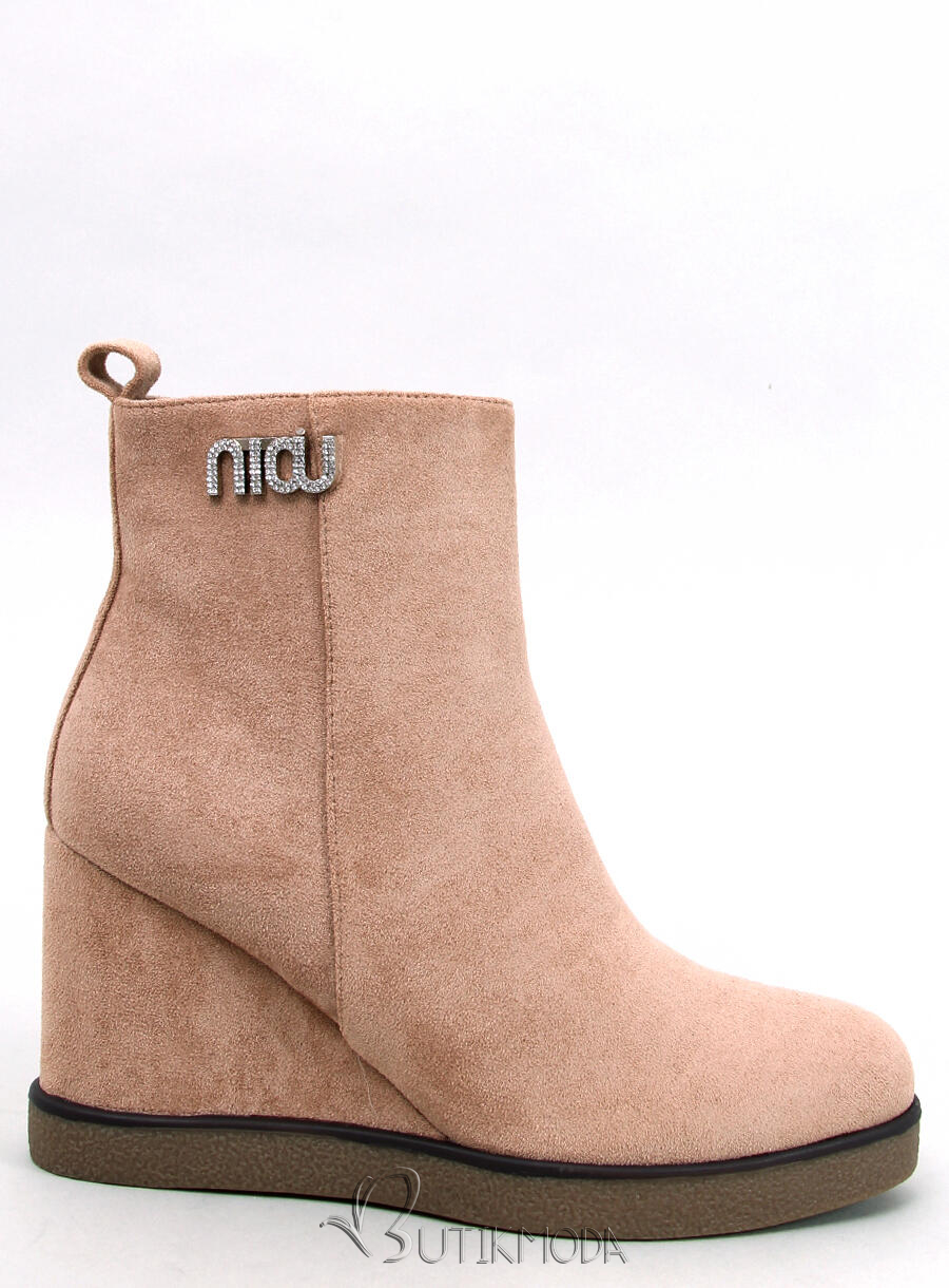 Beige ankle boots on a wedge heel