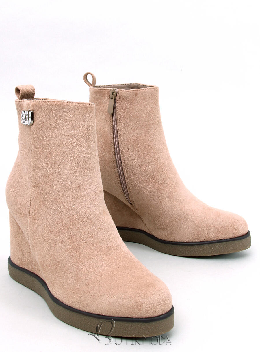 Beige ankle boots on a wedge heel