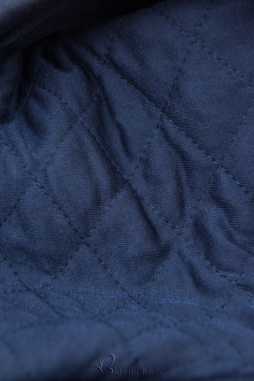 Dark blue elongated hoodie with quilted details