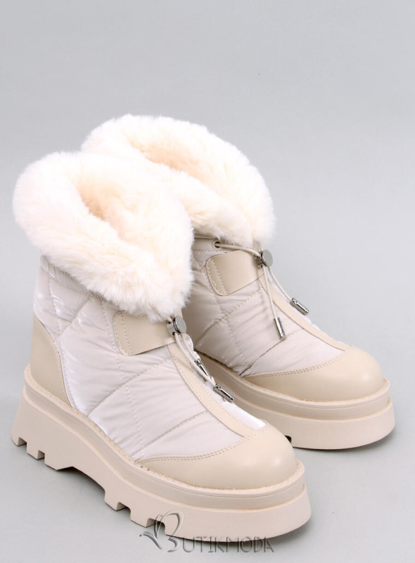 Beige snow shoes on a high platform