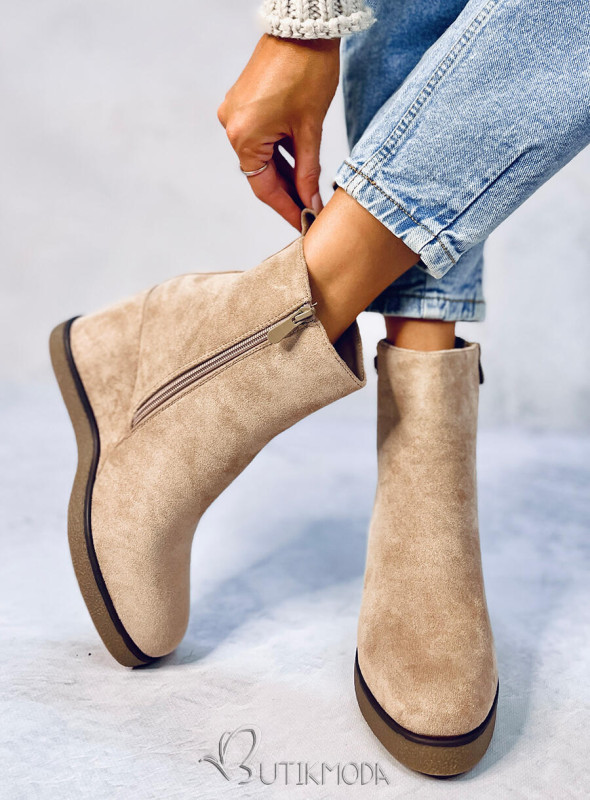 Beige ankle boots on a wedge heel