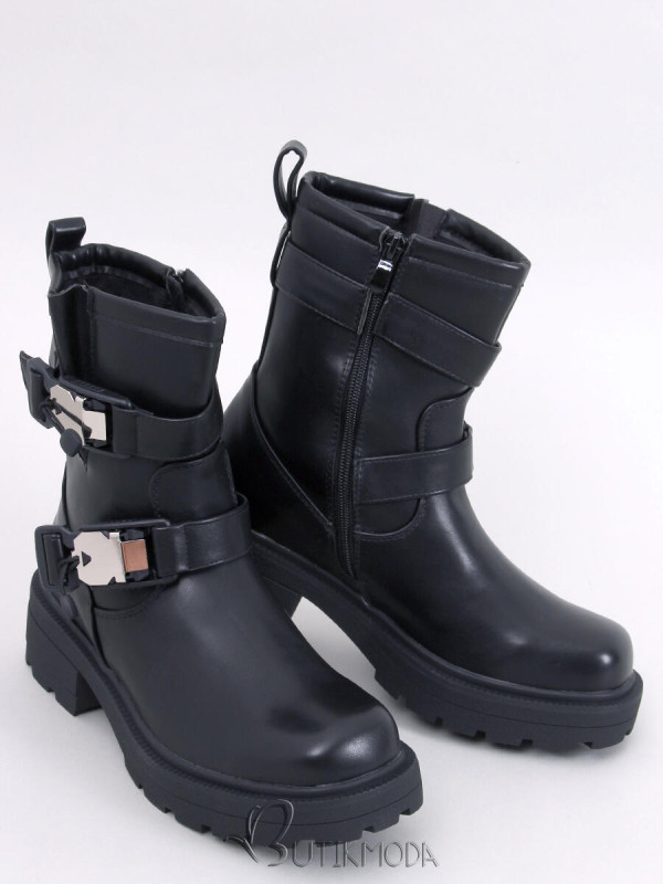 Black boots with buckles on a thick sole