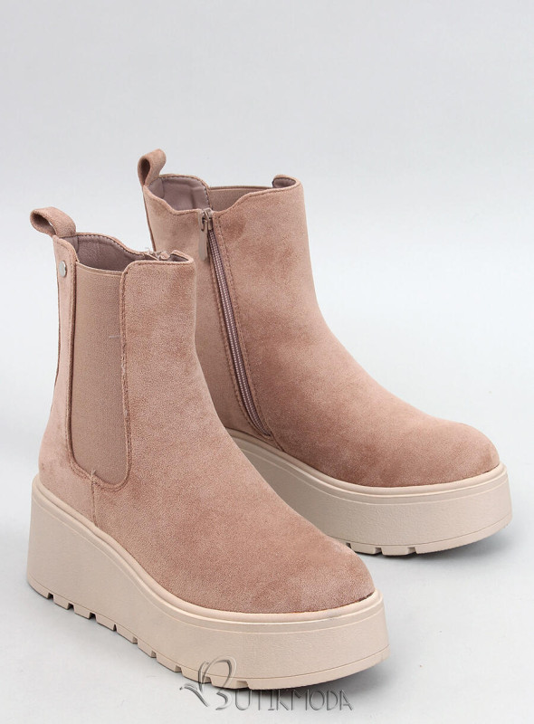 Beige chelsea boots on a high platform