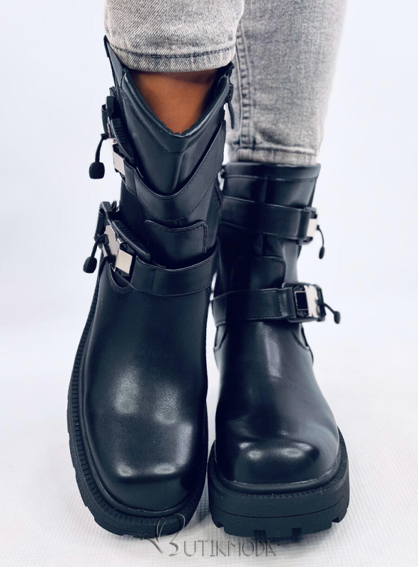 Black boots with buckles on a thick sole