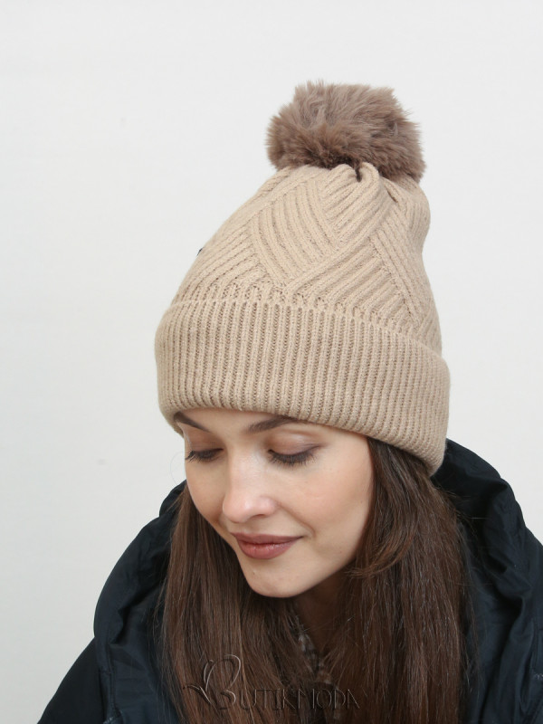 Winter knitted cap in beige color