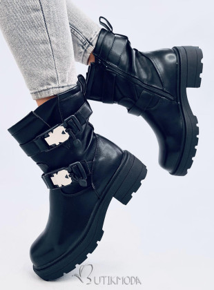 Black boots with buckles on a thick sole