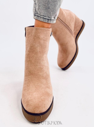 Beige ankle boots on a wedge heel