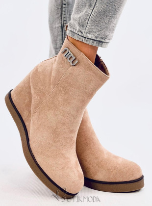 Beige ankle boots on a wedge heel