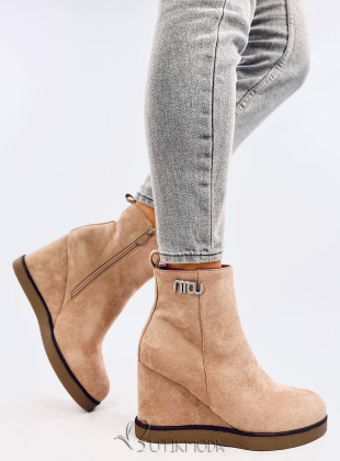 Beige ankle boots on a wedge heel