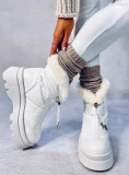 White snow shoes on a high platform