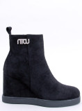 Black ankle boots on a wedge heel
