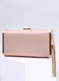 Light pink elegant handbag with tassel