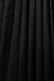 Grey dress with leather pleated skirt