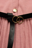Old pink girl's dress with a belt