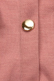 Old pink girl's dress with a belt
