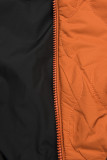 Reversible quilted parka orange/black