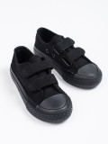 Black children's sneakers with velcro
