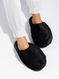 Black fur slippers on a thick sole