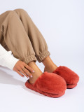 Coral red fur slippers on a thick sole