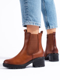 Brown chelsea boots with a low heel