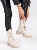 Light beige workery boots with decorative pins