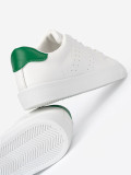 Classic White Sneakers with Green Accent