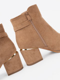 Stylish ankle boots in light brown with golden details