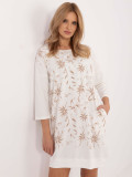 Elegant ecru dress with floral pattern