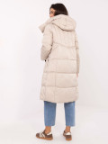 Beige long quilted coat with hood