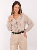 Elegant beige blouse with ruffle and puff sleeves