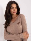 Beige blouse with embroidery and V-neckline