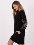 Short black dress with embroidery and puff sleeves