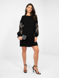 Black mini dress with embroidery and puff sleeves