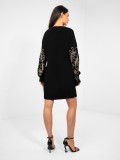 Black mini dress with embroidery and puff sleeves