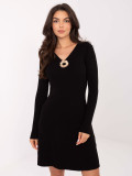 Elegant black ribbed mini dress with V-neck and long sleeves