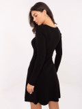 Elegant black ribbed mini dress with V-neck and long sleeves