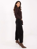Black balloon fit jeans with high waist and belt