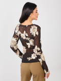 Elegant black blouse with beige embroidery and floral motif
