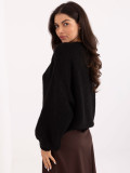 Black sweater with puff sleeves and round neckline