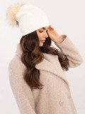 Elegant ecru beanie with pompom